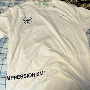 Over sized off white shirt it’s a medium but it’s really big